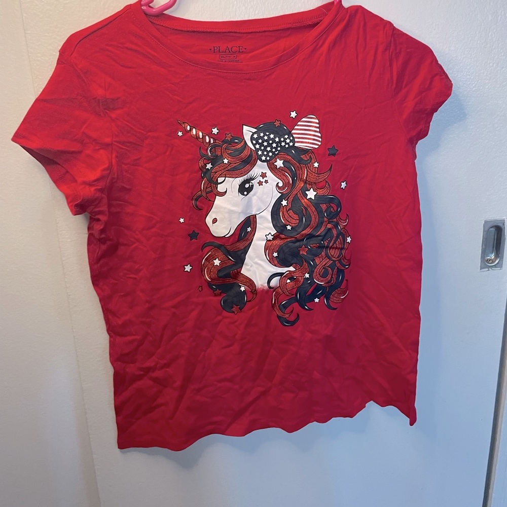 Children’s place red, white, and blue shirt.